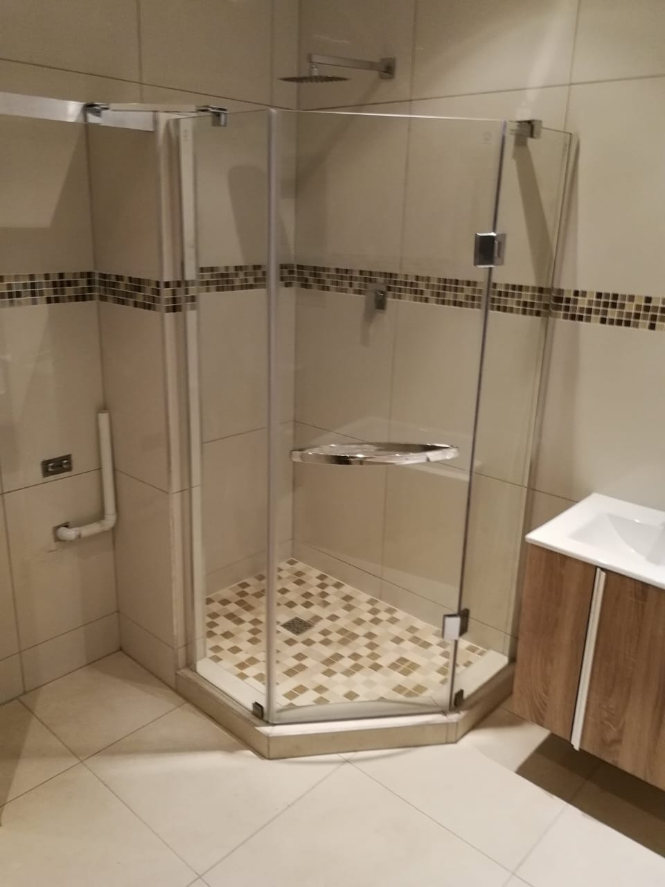 Shower + wall tiling